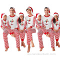 Feliz Navidad con estampado de pijamas navideños familiares